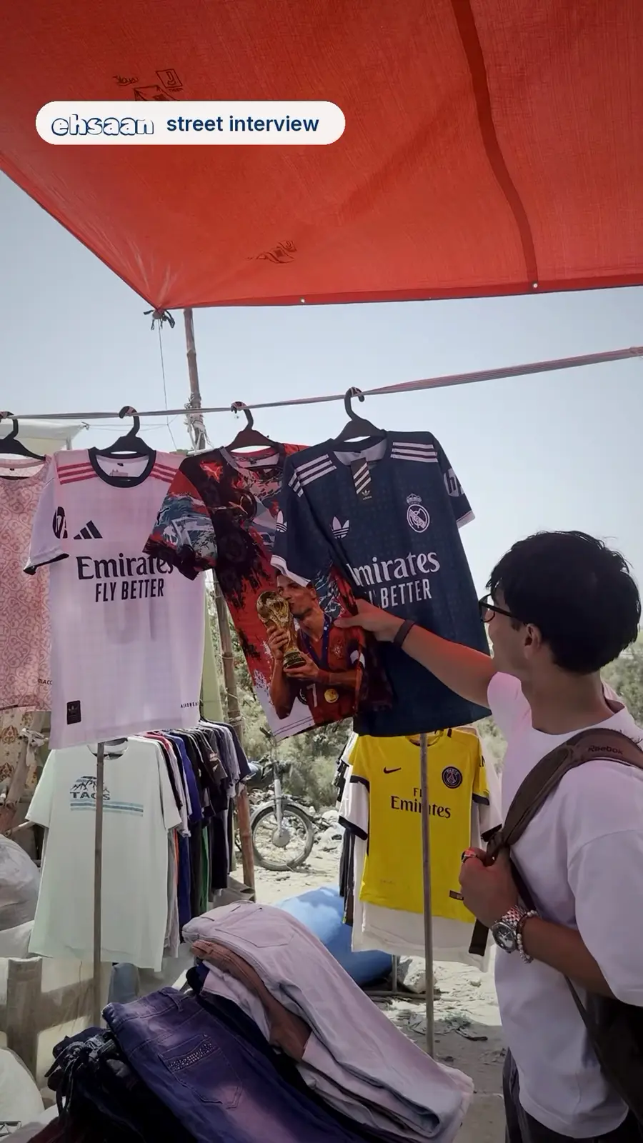 A thrift stall of football shirts in Karachi, from ehsaan's launch reel.