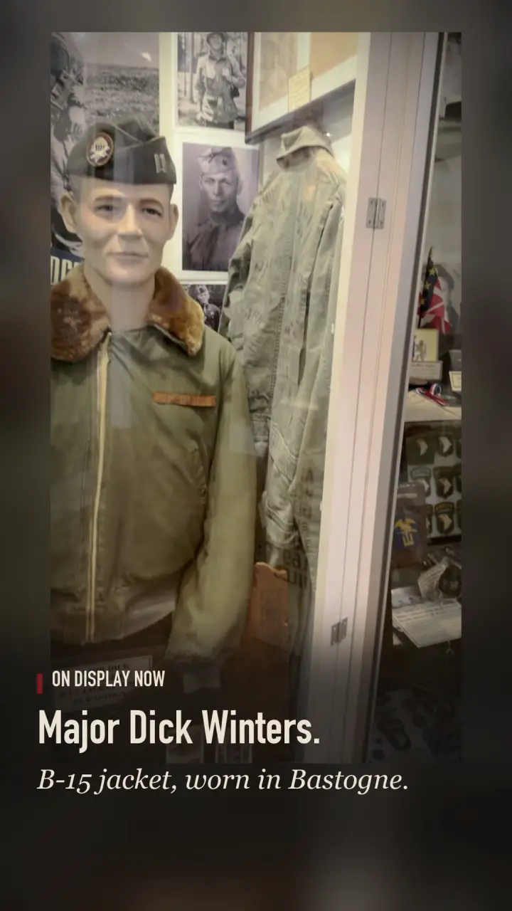 A frame from the reel Worn in Bastogne: a jacket on display in the museum.